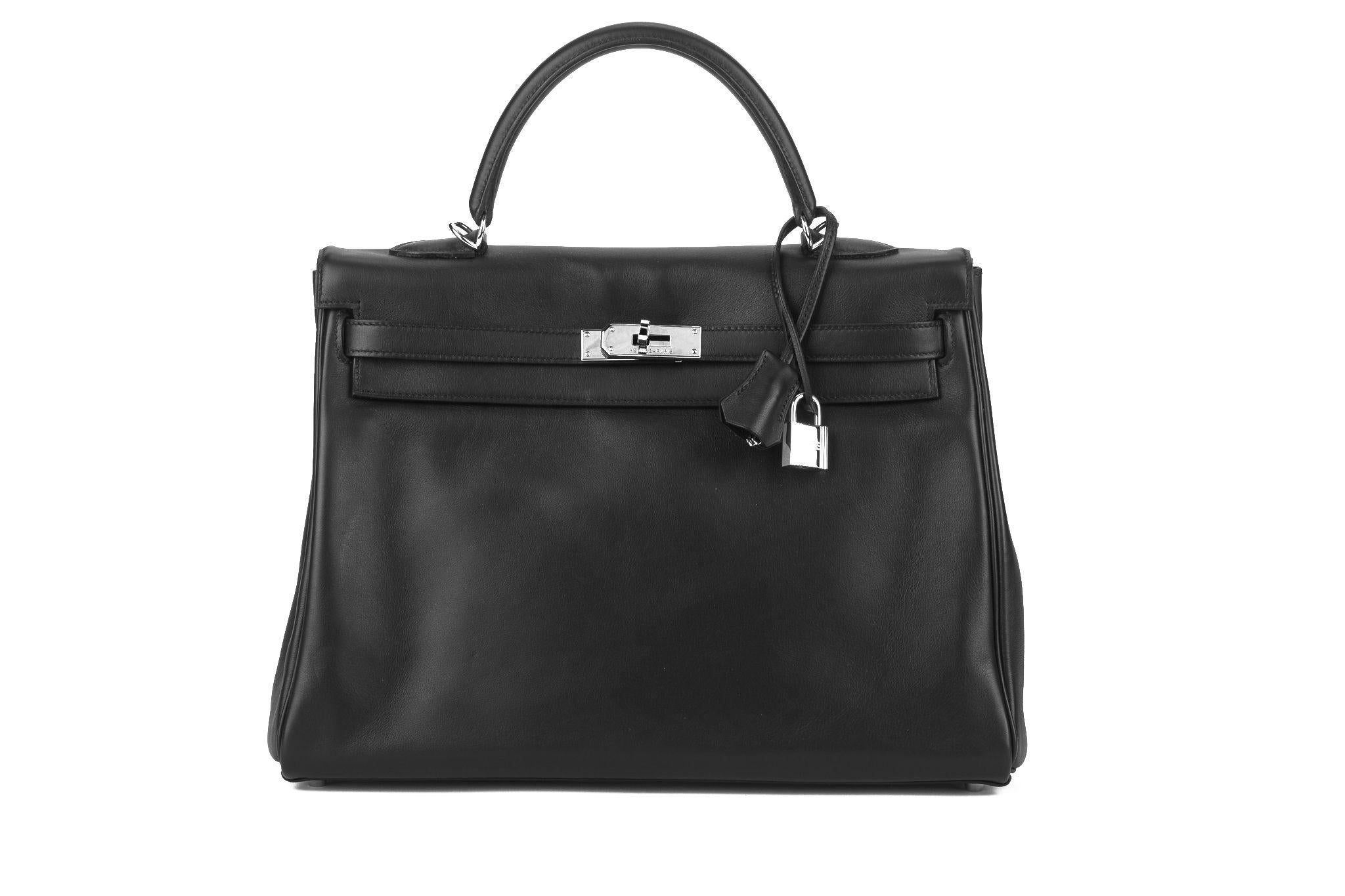 Hermès 35cm Kelly Retourne bag in black swift leather and palladium hardware. Handle drop, 3.5