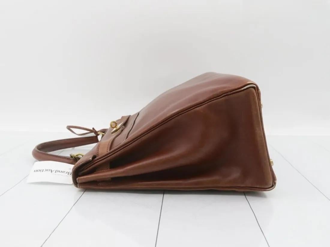 Women's Hermes Kelly 35 Retourne Brown Box Calfskin Leather Gold Hardware For Sale