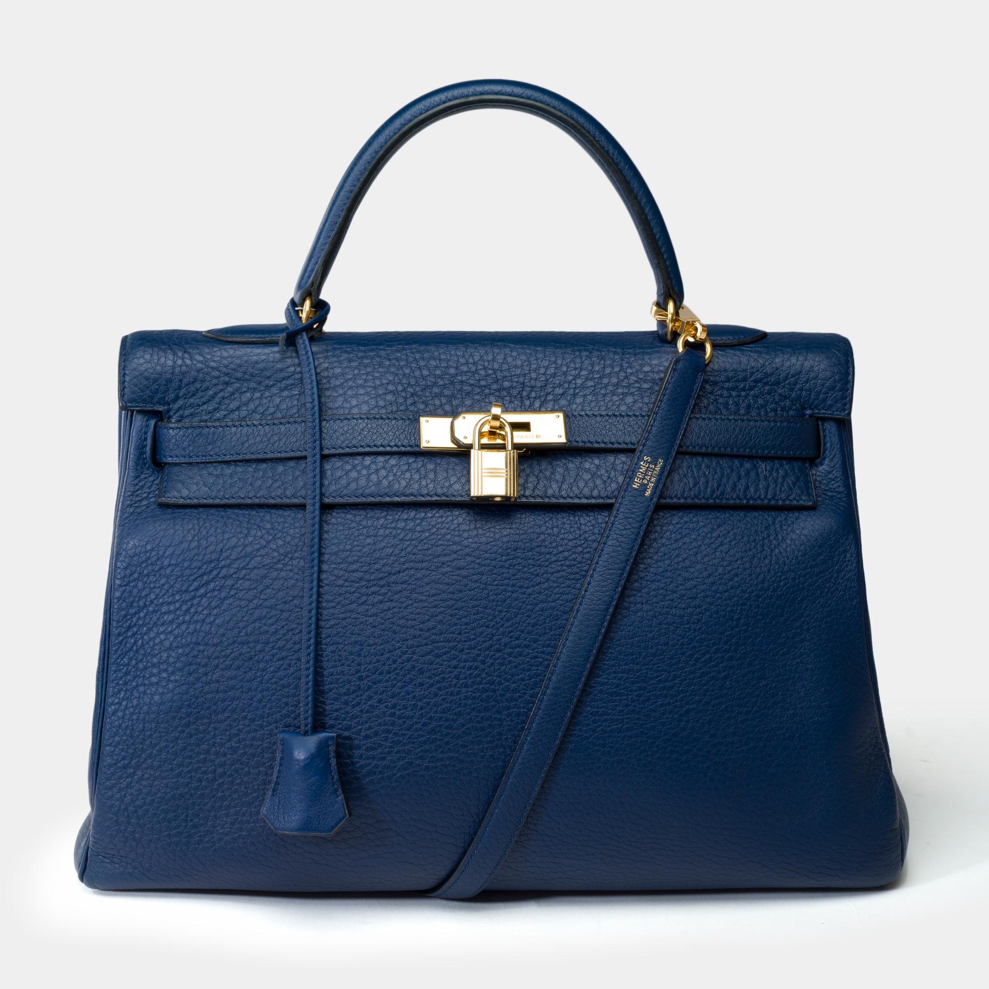 Magnificent​​​​ ​​​​Hermes​​​​ ​​​​Kelly​​​​ ​​​​35​​​​ ​​​​retourne​​​​ ​​​​handbag​​​​ ​​​​strap​​​​ ​​​​in​​​​ ​​​​Blue​ ​Saphir​ ​​​​Taurillon​ ​Clemence​ ​blue​ ​Saphire,​ ​​​gold-plated​​ ​​metal​​ ​​trim,​​​​ ​​​​blue​​​ ​​​​leather​​​​