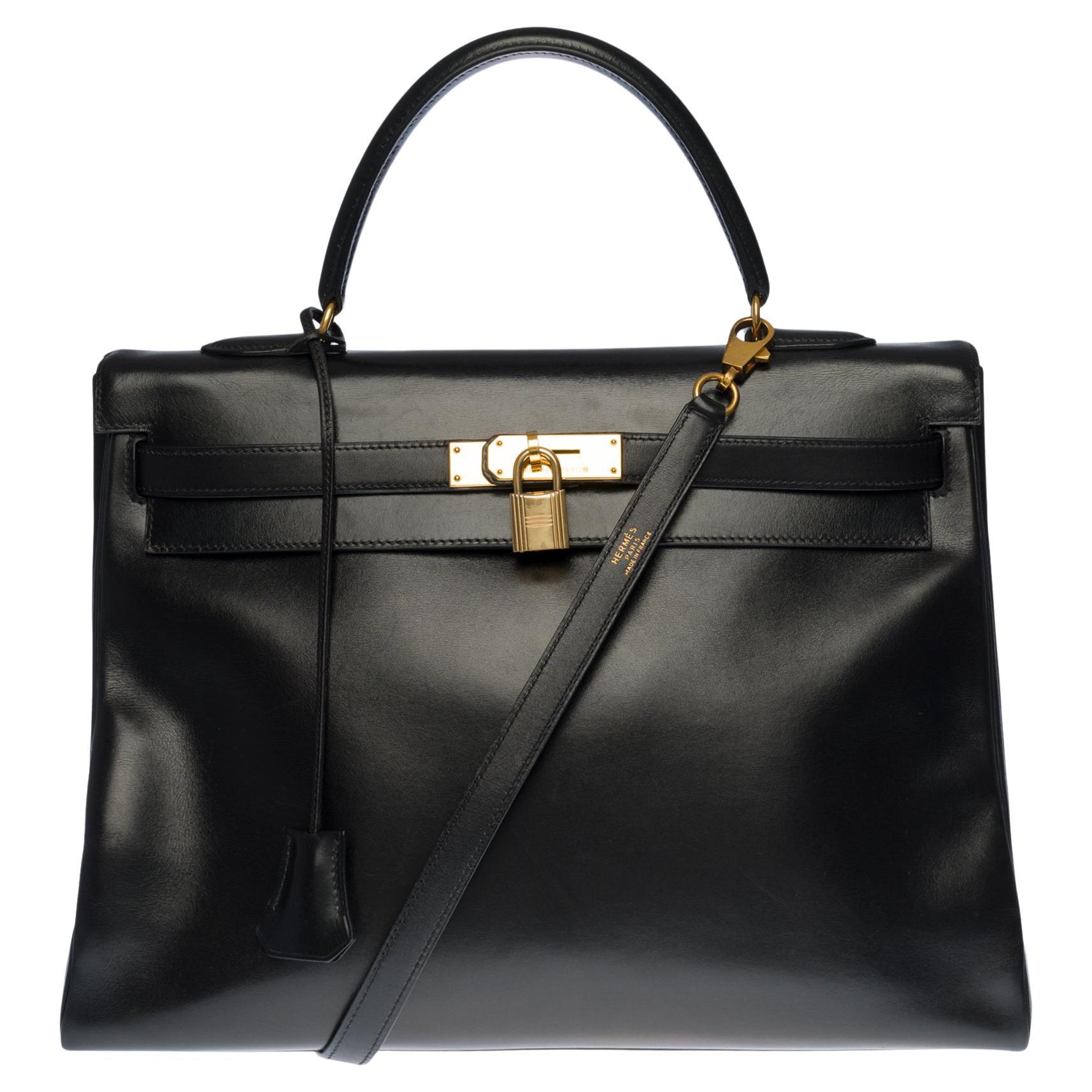 Hermès Kelly 35 retourné handbag with strap in Black Calf leather, GHW