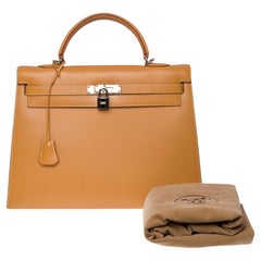 Hermès Kelly 35 sellier handbag in gold vache naturelle calf, silver hardware