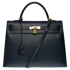 Hermès Kelly 35 sellier Handtasche Riemen in Courchevel bleu nuit Leder, GHW
