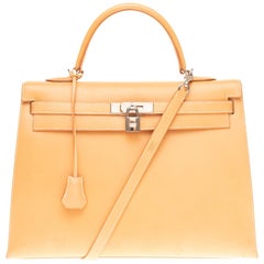 Hermès Kelly 35 sellier in natural calf leather with strap and Gold hardware