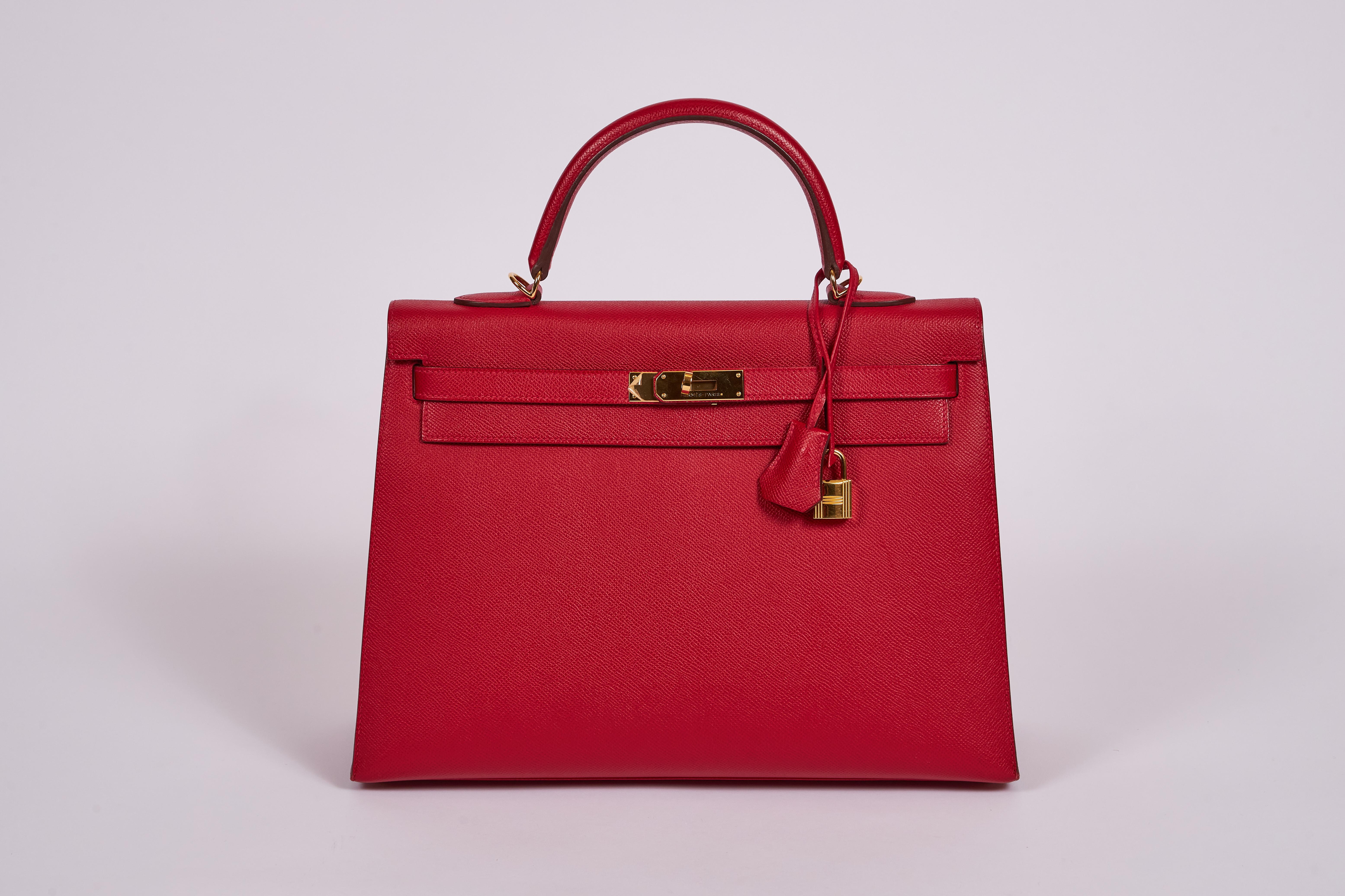 Hermes kelly bag 35 cm seller in rouge casaque epsom leather and gold tone hardware. Detachable strap, 35