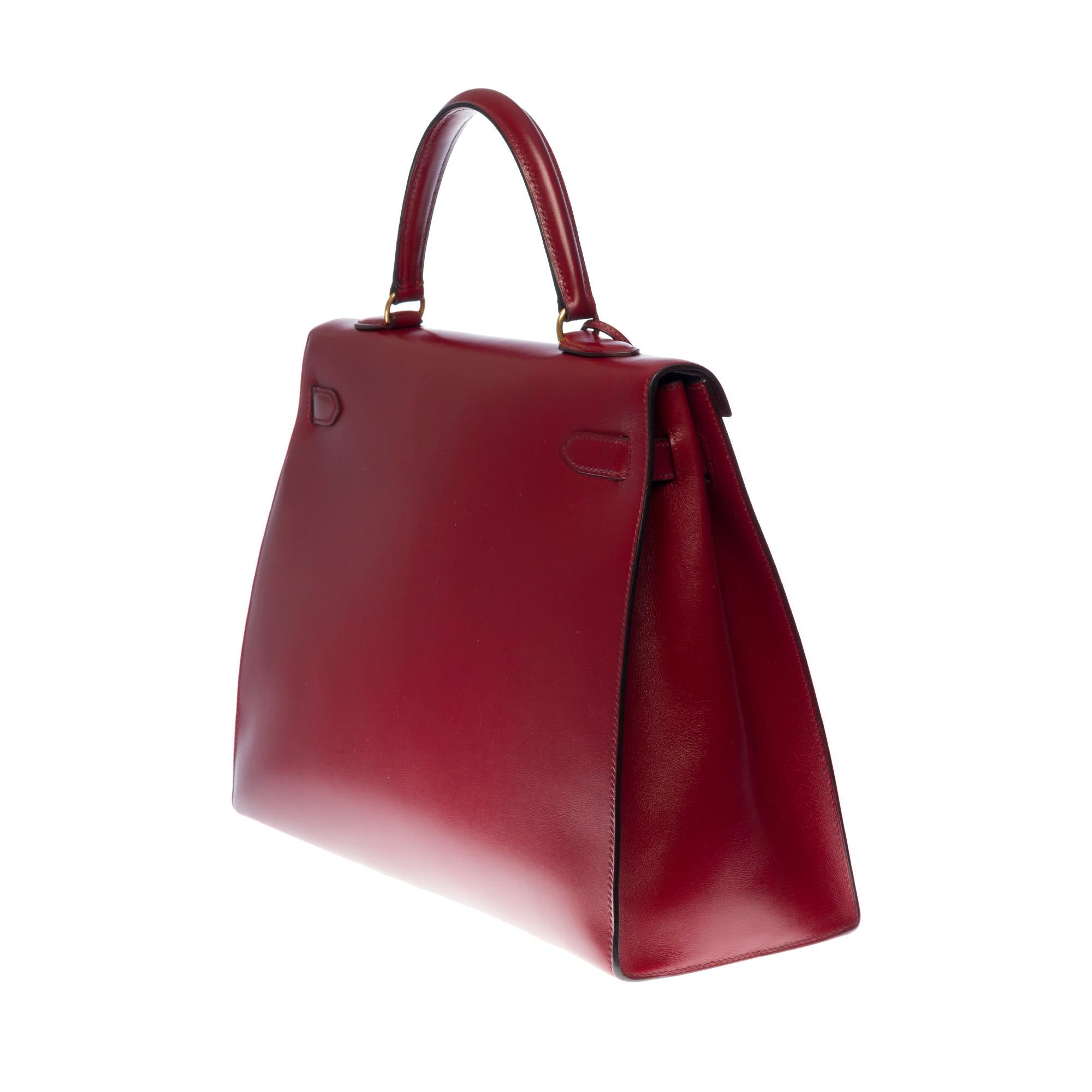 Hermès Kelly 35 sellier strap shoulder bag in burgundy calf leather, GHW In Good Condition In Paris, IDF