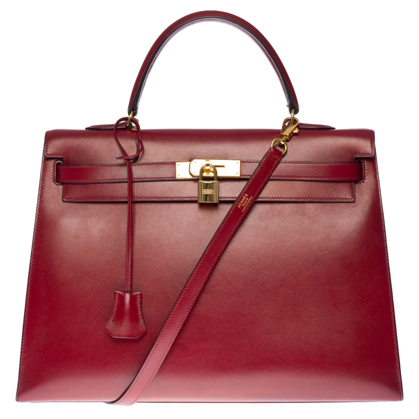 Hermès Kelly 35 sellier strap shoulder bag in burgundy calf leather, GHW
