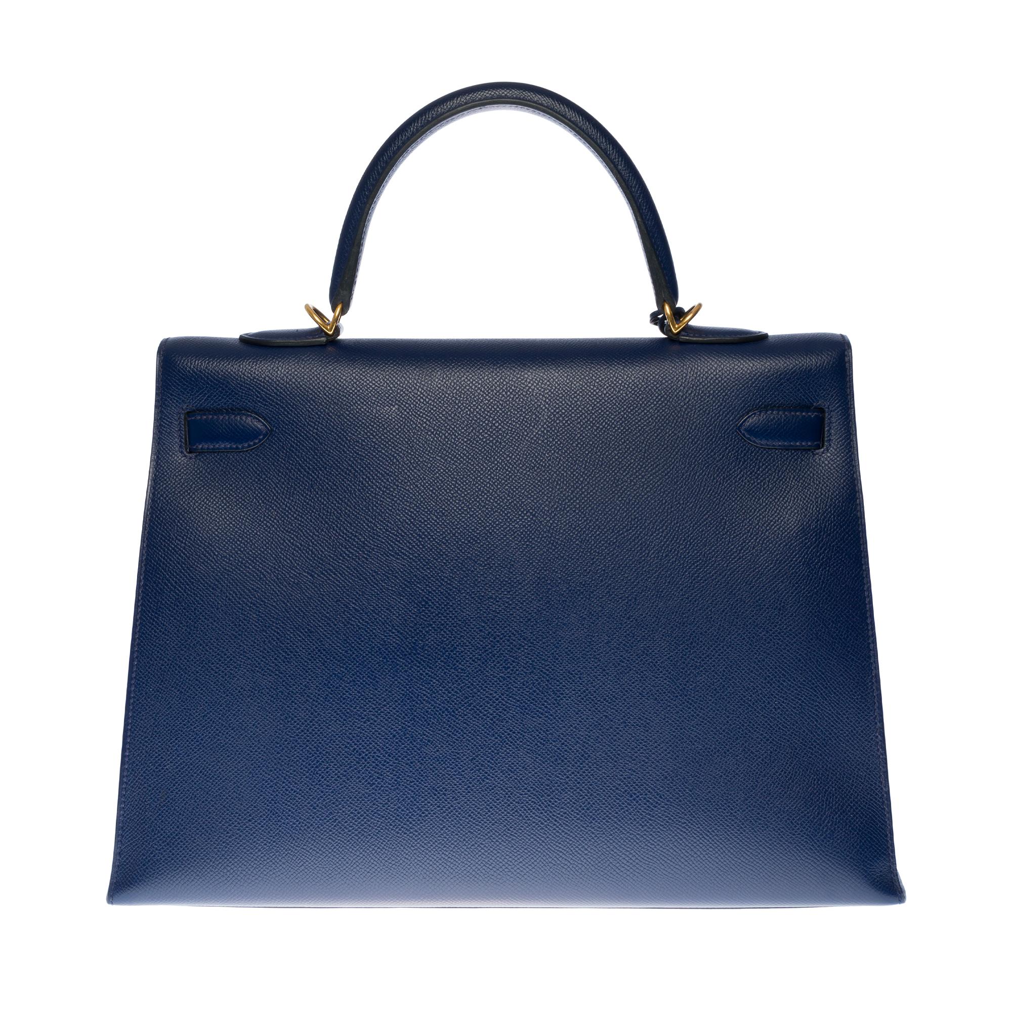 Beautiful Hermes Kelly 35 cm sellier in Epsom blue sapphire leather shoulder bag , gold plated metal hardware, blue leather removable shoulder strap, blue leather simple handle allowing a hand or shoulder strap.
Closure by flap.
Lining in blue