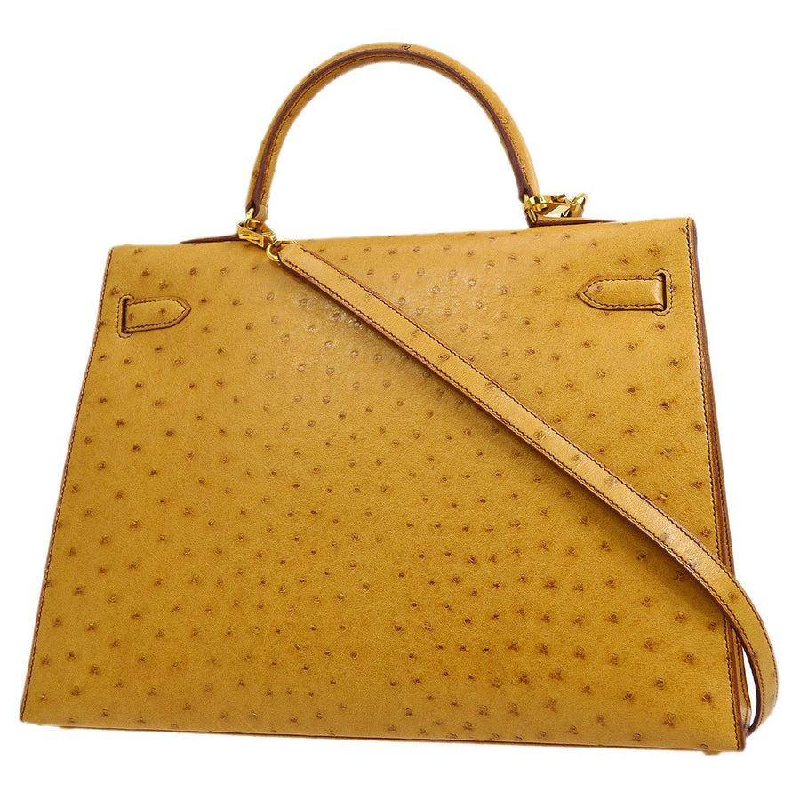 gold top handle bag