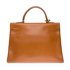 Hermès Kelly 35 strap shoulder bag in Gold Couchevel leather with gold hardware