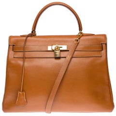 Hermès Kelly 35 strap shoulder bag in Gold Couchevel leather with gold hardware 