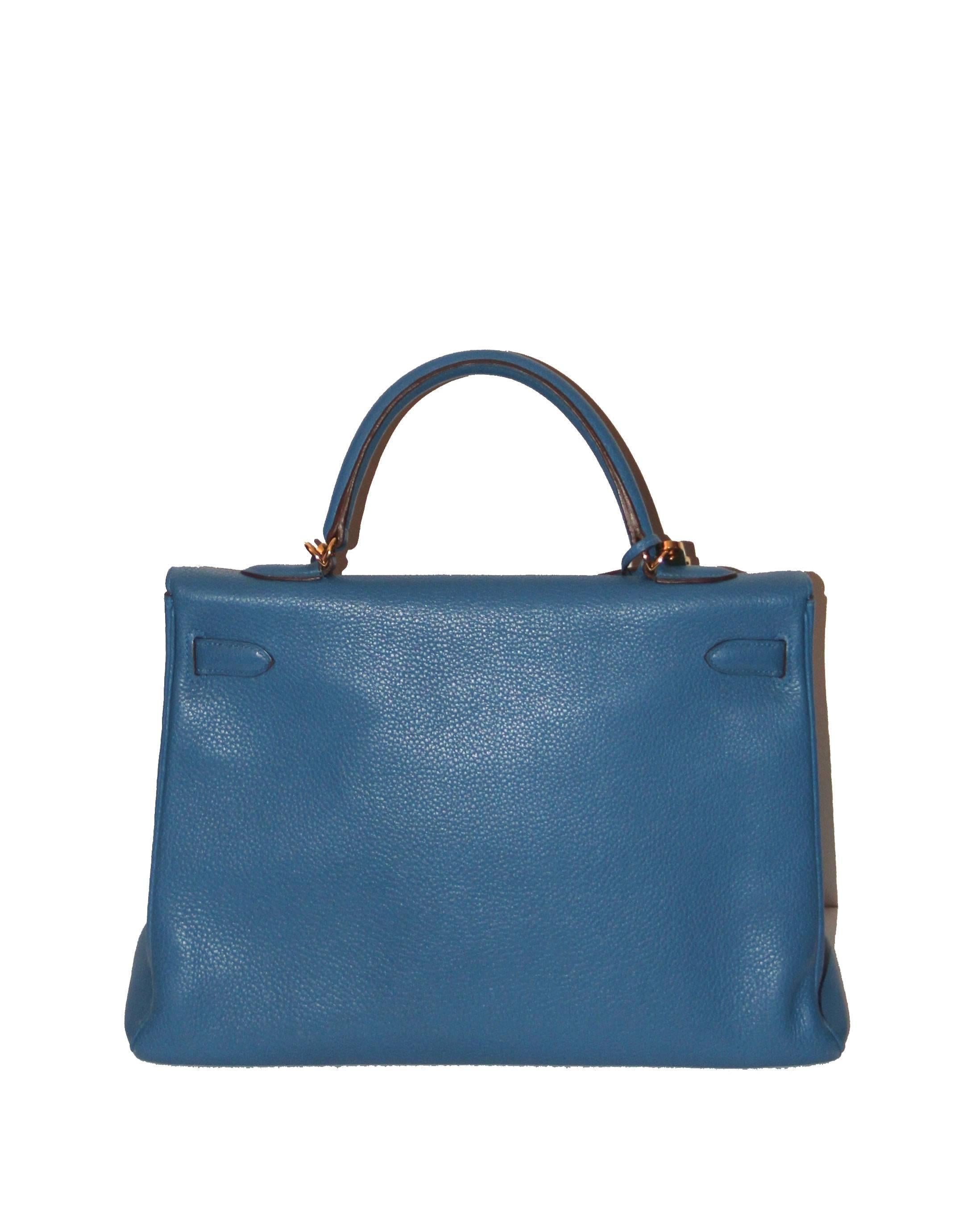 Wonderful Kelly retourné 35 cm bag from Hermès featuring an amazing blue color in Taurillon Clemence leather. Top handle in leather and extra shoulder strap allowing the bag to be worn either in the hand or at the shoulder.
Leather: Clemence