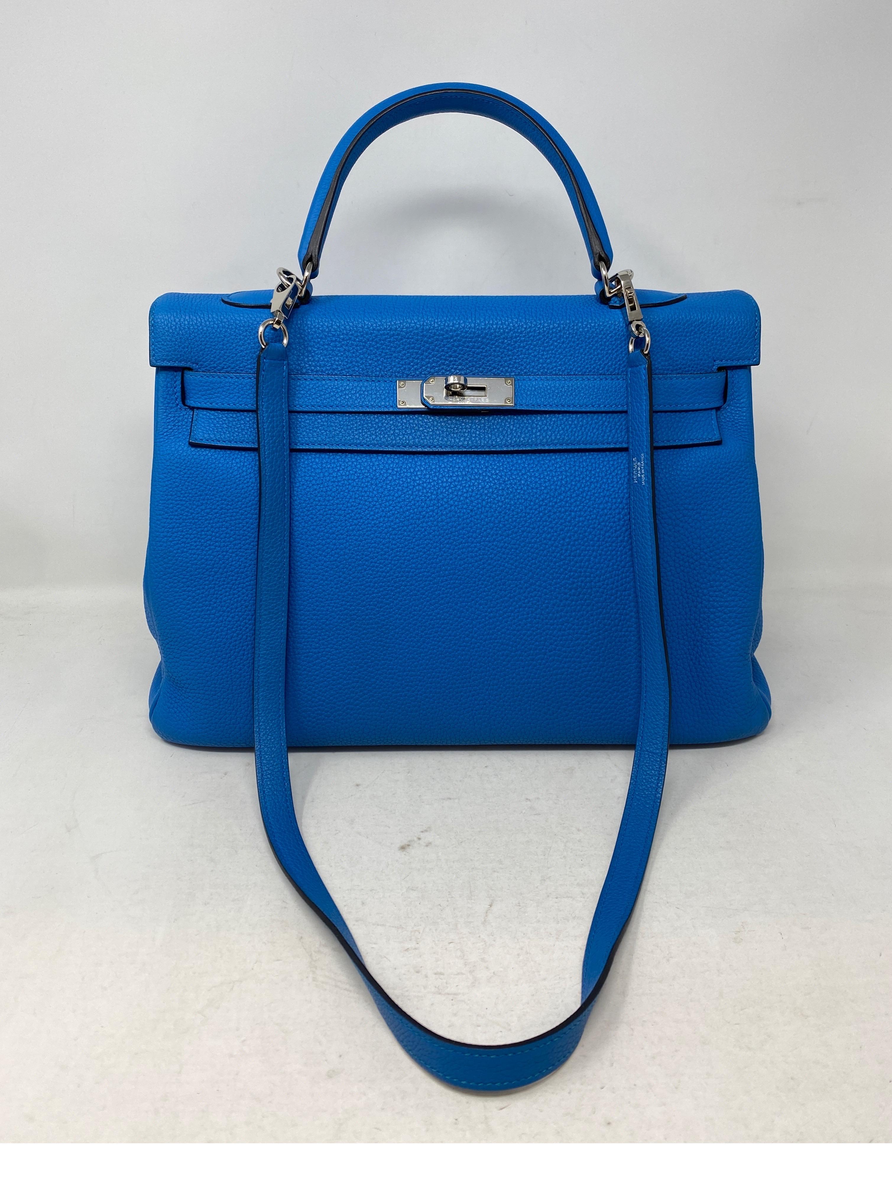 Hermes Kelly 35 Zanzibar Blue Bag. Palladium hardware. Excellent condition. Looks like new. From 2017. Includes original receipt and Bababebi authenticity certificate. Plastic still on hardware. Includes strap, clochette, lock, keys, and dust cover.