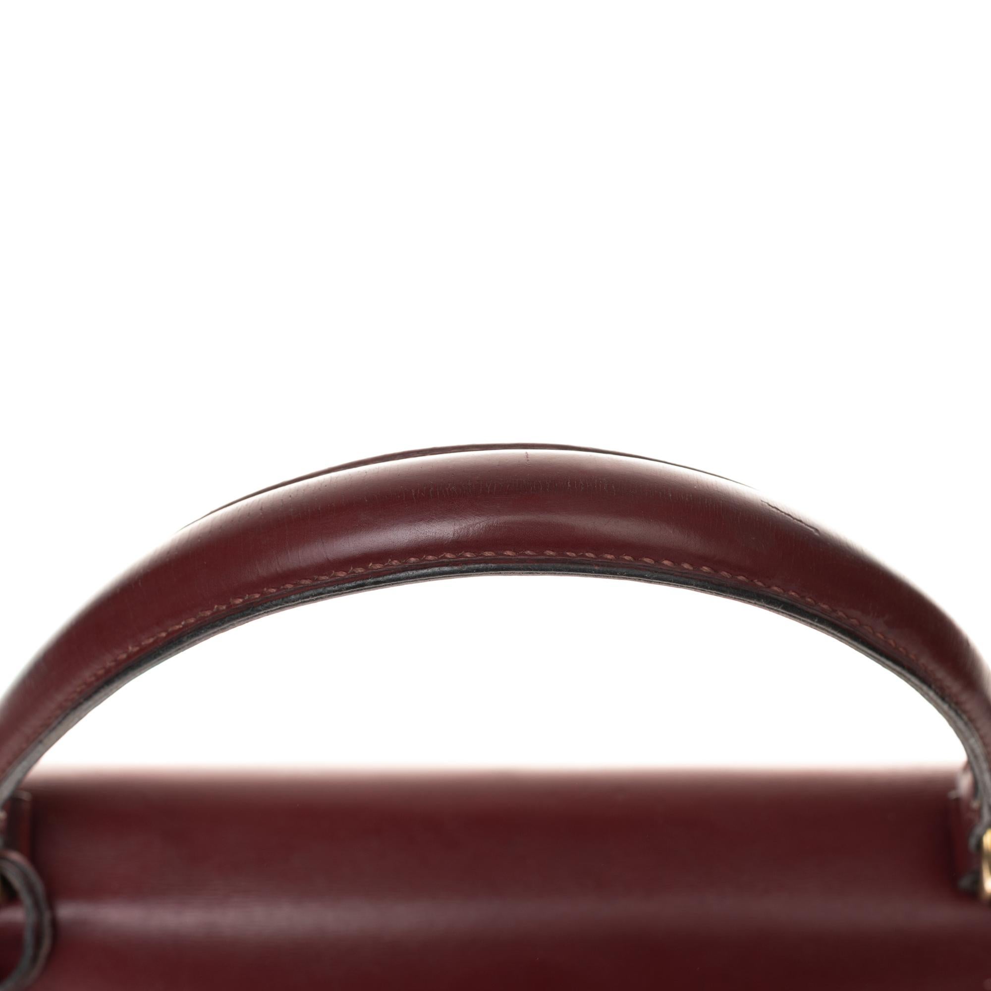 Women's Hermès Kelly 35cm handbag bi-material in beige canvas and burgundy calf leather
