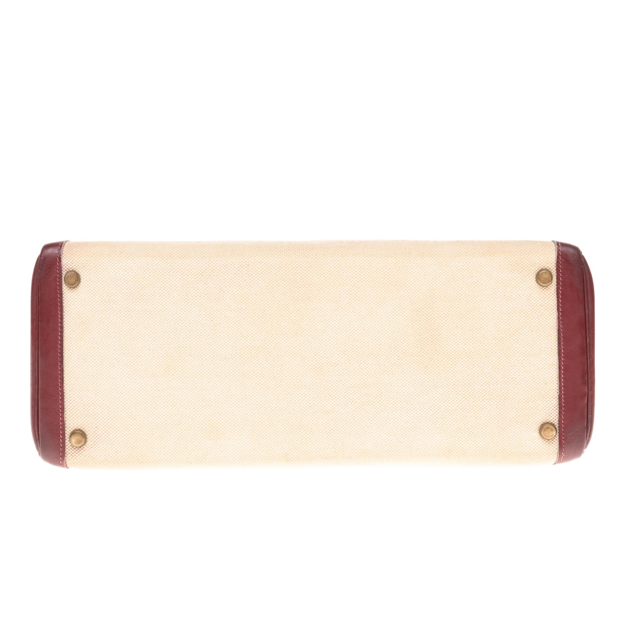 Hermès Kelly 35cm handbag bi-material in beige canvas and burgundy calf leather 1
