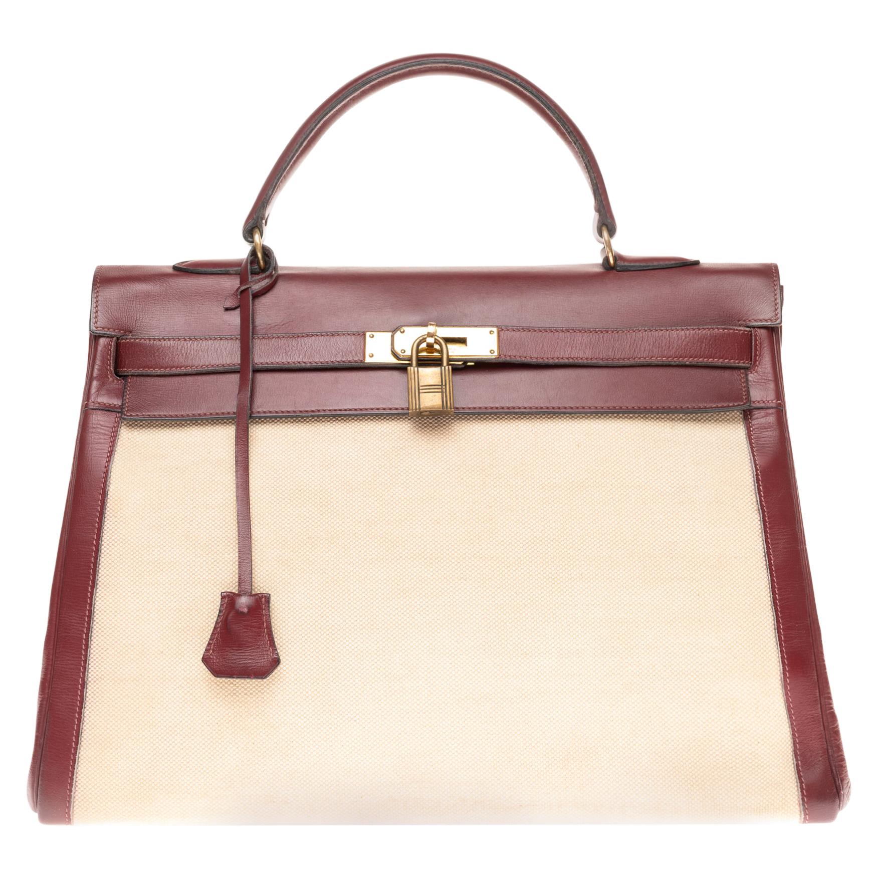 Hermès Kelly 35cm handbag bi-material in beige canvas and burgundy calf leather