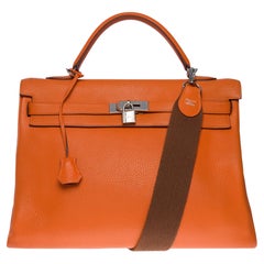 Hermes Kelly 40 retourne handbag strap in Orange Togo leather, SHW