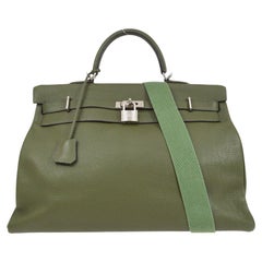 HERMÈS Kelly 50 Taurillon Clemence en cuir et palladium vert  Sac à main à poignée supérieure