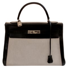 Borsa Kelly di Hermes 32cm in tela con finiture in pelle nera Gulliver Classic Leather Vintage