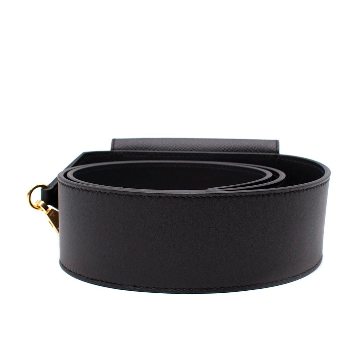 Hermes Kelly Black Leather Pocket Strap - Colour Sold Out/Rare

- Featuring the Kelly style pouch with a wide fit leather shoulder strap
- Gold tone hardware 
- Swift & Epsom leather 
- Snap hook closures at each end

Age: Y 2020

Materials:
Swift