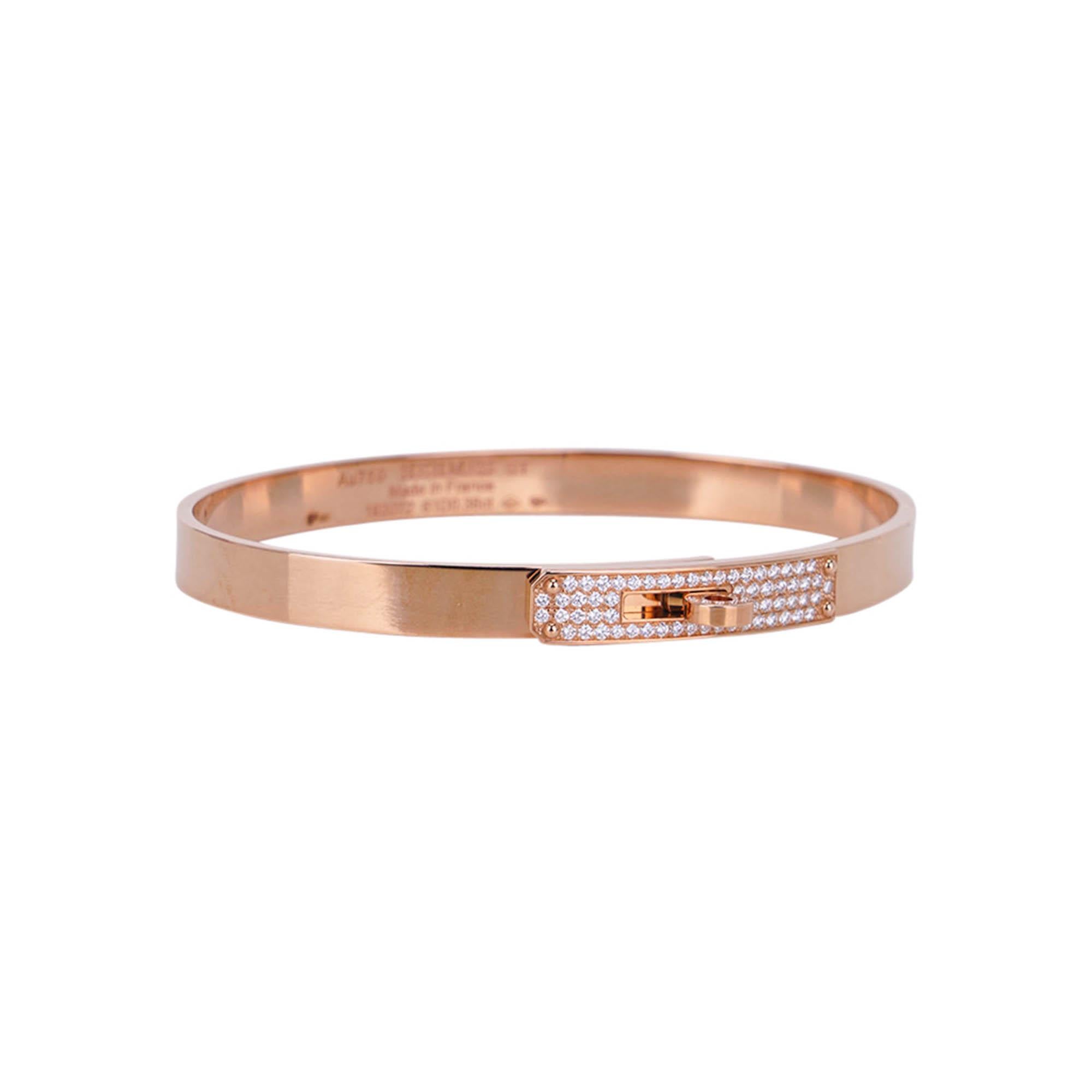 Mightychic offers a chic and instantly recognizable Hermes Kelly Bracelet Small Model.
Iconic bracelet with turn clasp featured in 18k rose gold and set with 61 diamonds.
Total carat weight is .36.
Perfect for everyday wear paired with everything