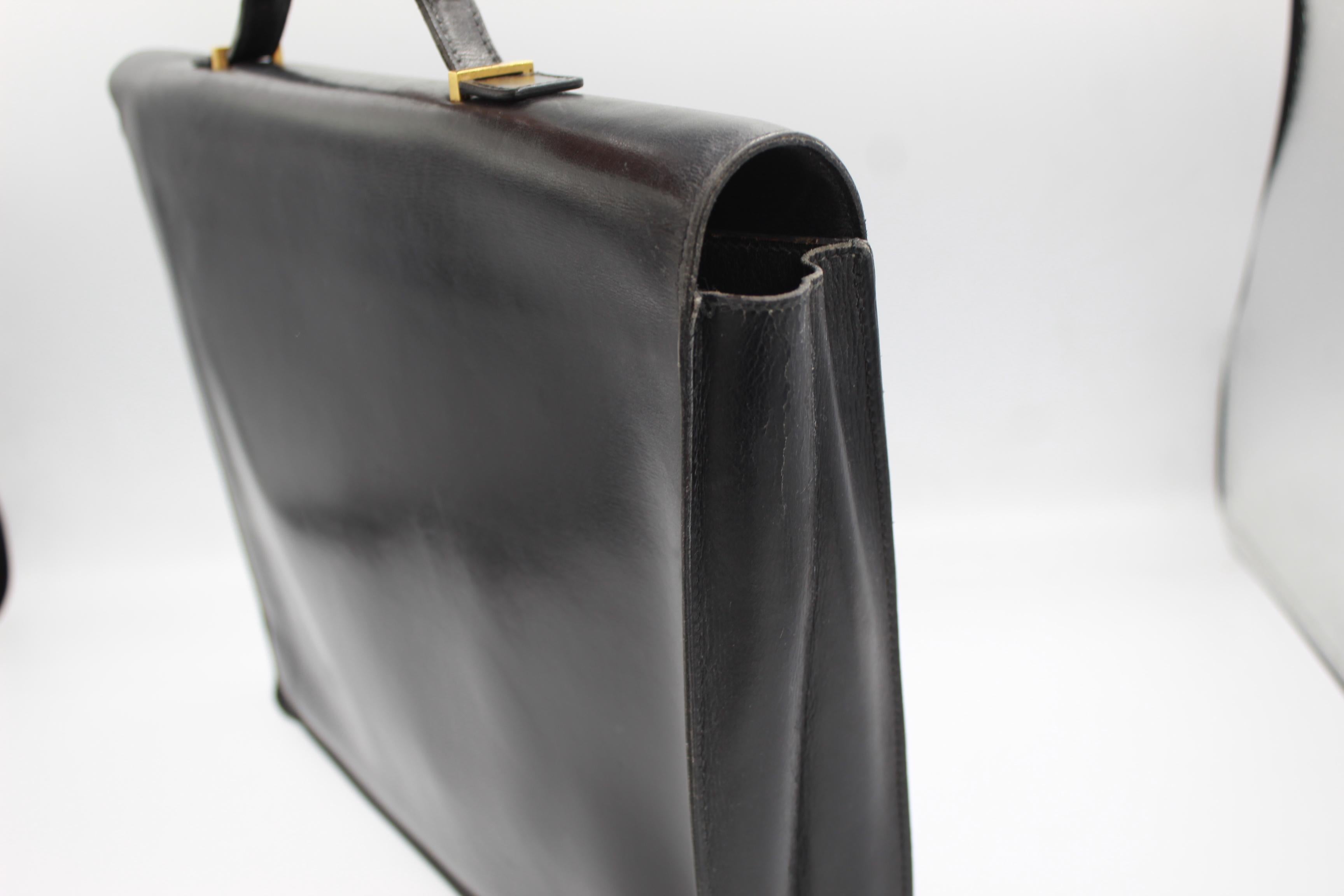 Black Hermes Kelly brief case in black leather. For Sale