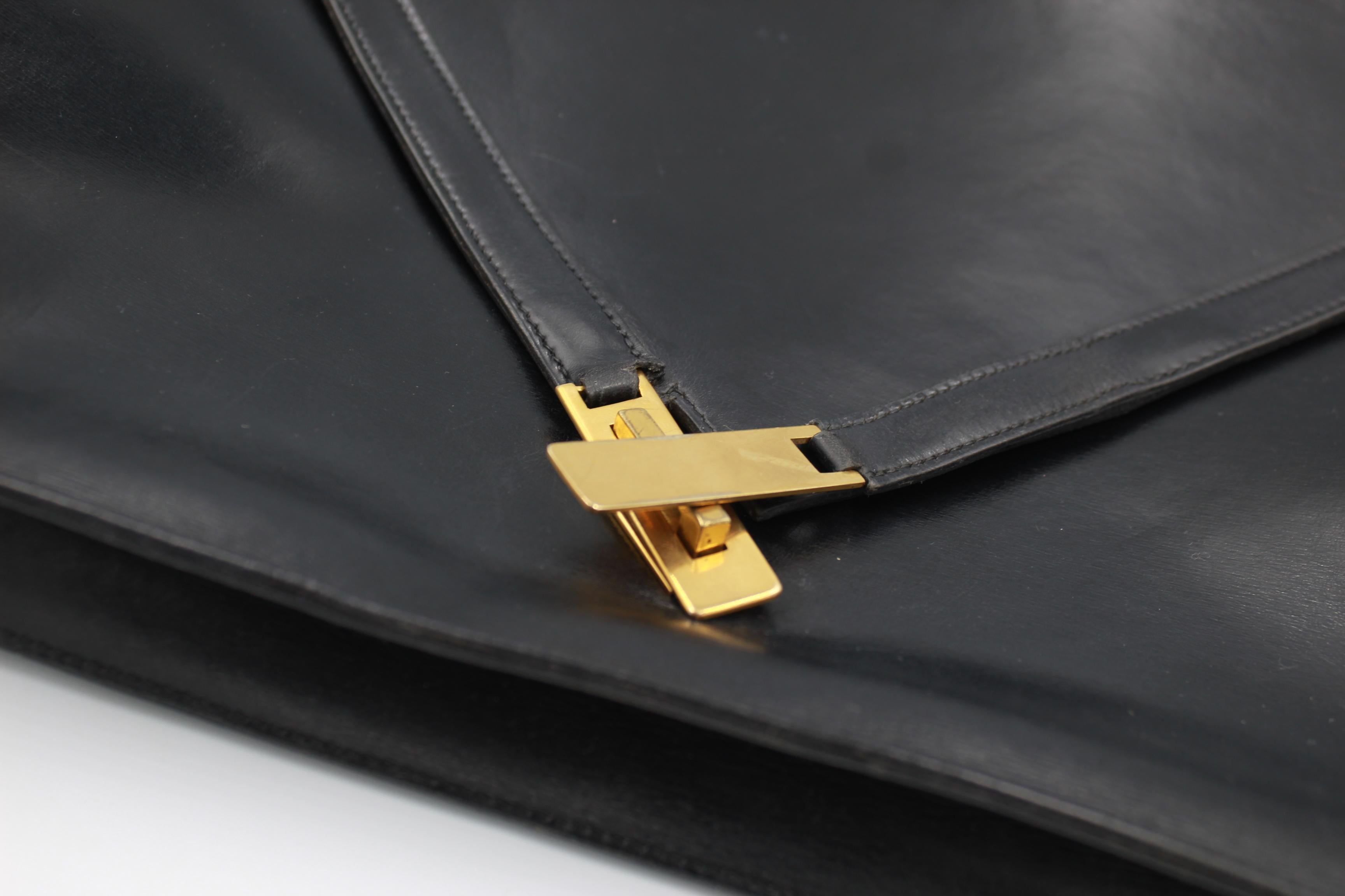 Women's Hermes Kelly brief case in black leather. For Sale
