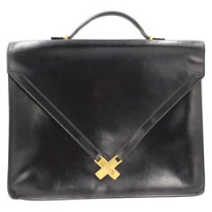 Hermes Kelly brief case in black leather.