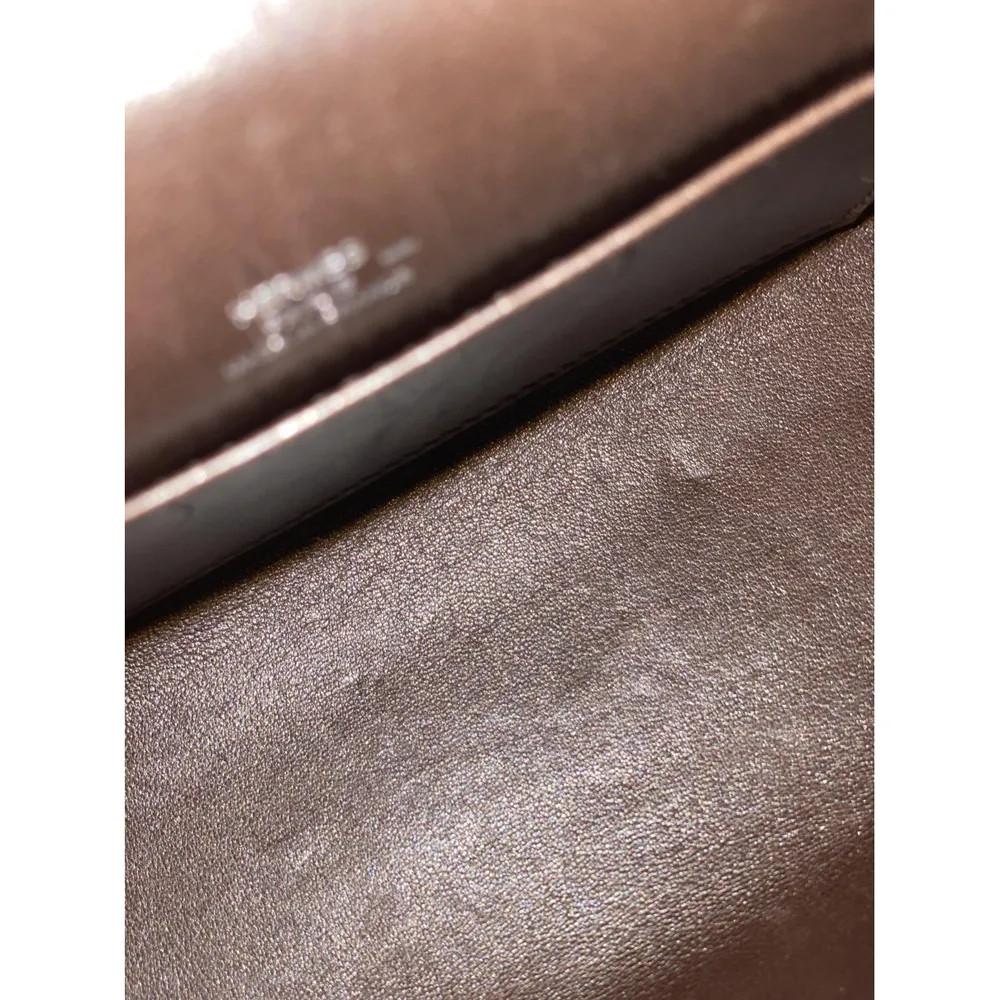 Hermès Kelly pochette brown lizard 1