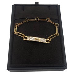 Pulsera Hermes Kelly de cadena, oro de 18 quilates con pavé parcial de diamantes, talla SH
