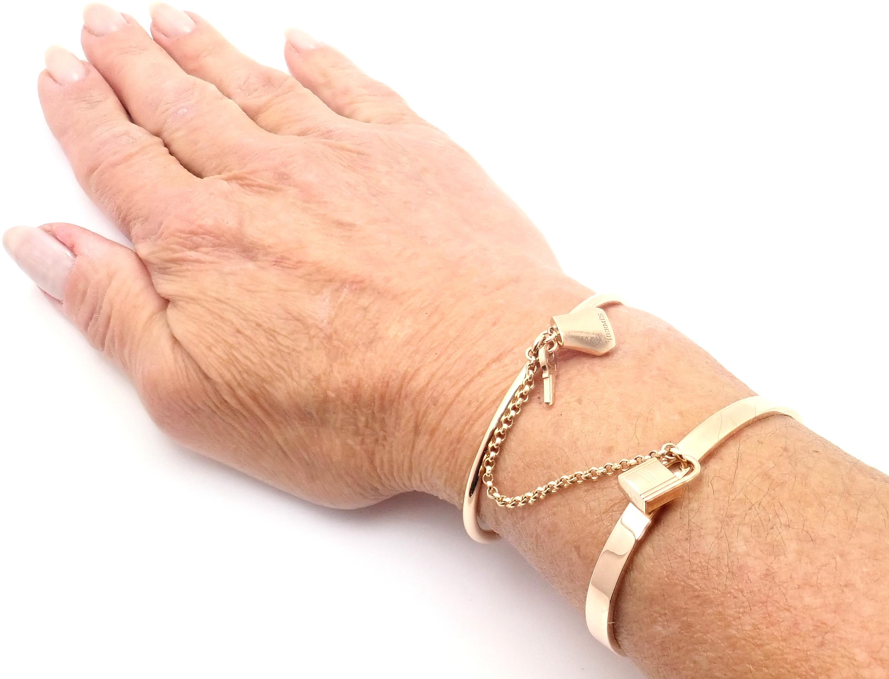 Hermès Kelly Clochette Bracelet jonc à double poignet en or rose en vente 1