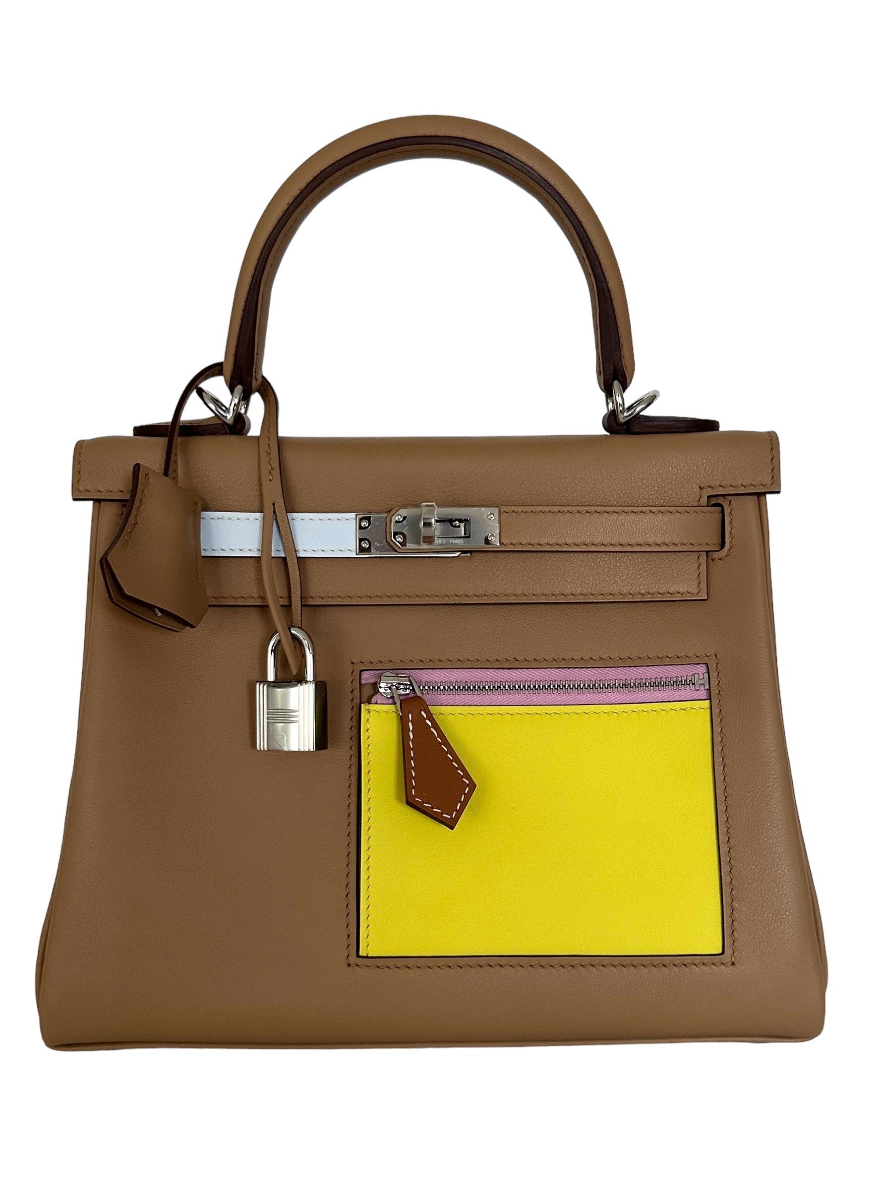 
Hermes Limited Edition Colormatic Kelly 25cm
The Hermes Kelly Colormatic is a limited edition collection of the iconic Hermes Kelly bag.
An Hermès Kelly Colormatic 25, beautifully handcrafted from Swift leather in Chai, Lime, Blue Brume, Cassis,