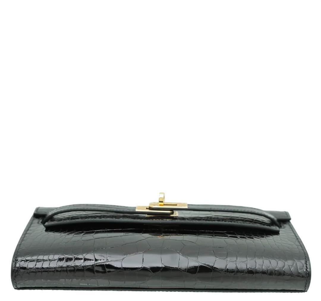 Hermès Kelly Cut Clutch Elan Crocodile Porosus Lisse 89 Noir GHW In New Condition For Sale In New York, NY