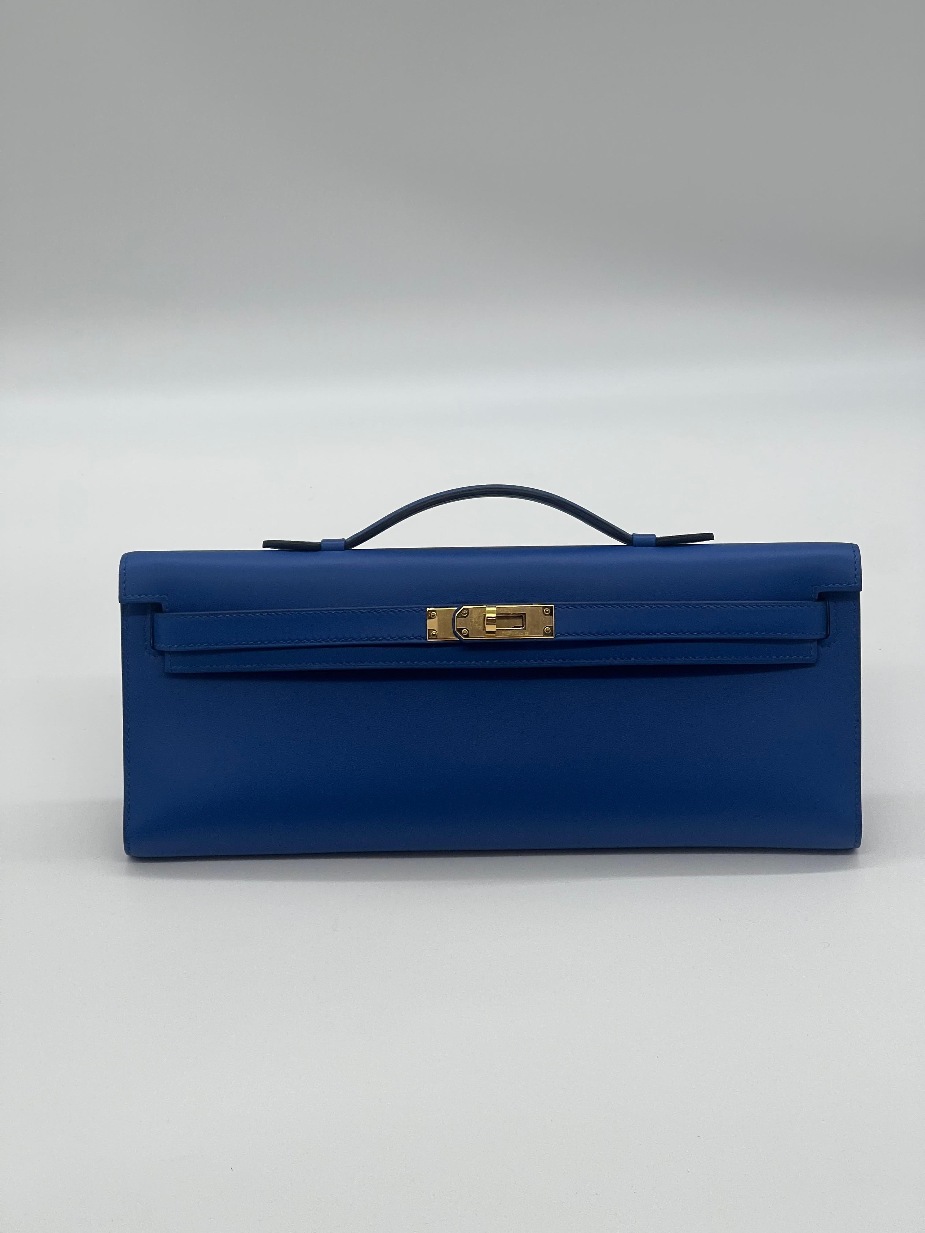 Hermes Kelly Cut Clutch Swift Calfskin Bleu France, Gold Hardware

Condition: Brand New
Measurements: (W)12.25 x (H)5 x (D)1 inches
Material: Calfskin Leather
Hardware: Gold plated
 
Comes in full original packaging.
Included original Hermes rain