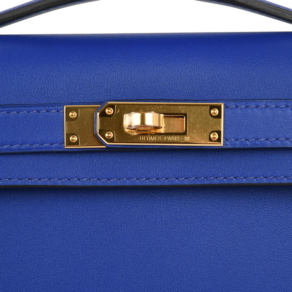 Guaranteed authentic timeless Hermes Kelly Cut feature in rich jewel toned Electric Blue.
This brilliant vivid blue is perfect day to evening.
Swift leather. 
Lush with Gold hardware.
Comes with box, sleeper and signature Hermes box.  
NEW or NEVER