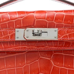 Hermès Kelly Cut Geranium Crocodile Clutch