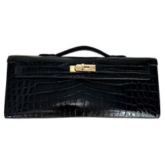 HERMES Kelly Cut "Noir" Crocodile Niloticus noir brillant Permabrass Hardware