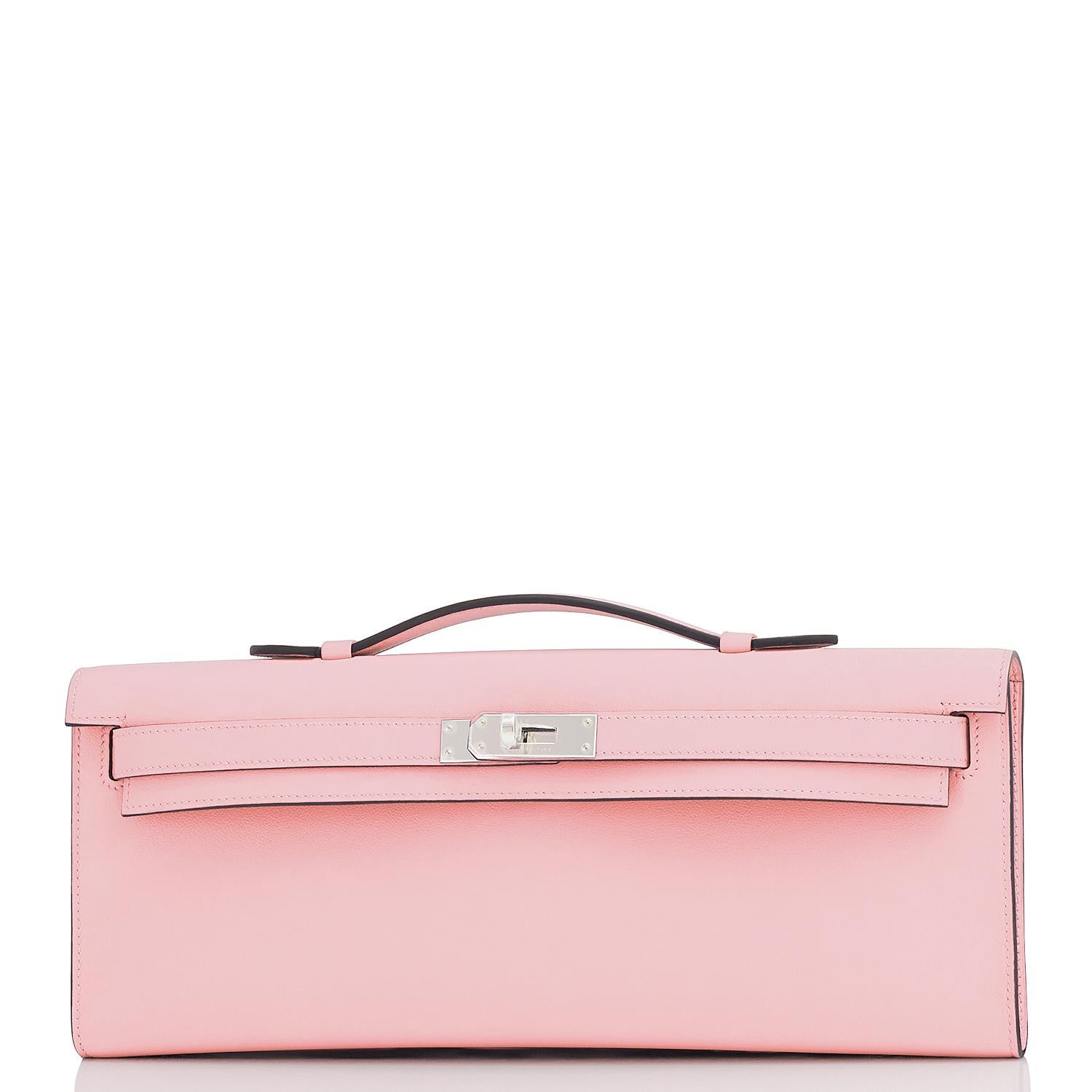 Hermes Kelly Cut Rose Sakura Pale Pink Clutch Swift New RARE
Ultra rare cult favorite Rose Sakura in NEW condition!
Brand New in Box. Store fresh. Pristine condition (with plastic on hardware).
Perfect gift! Comes with Hermes dust bag, replacement