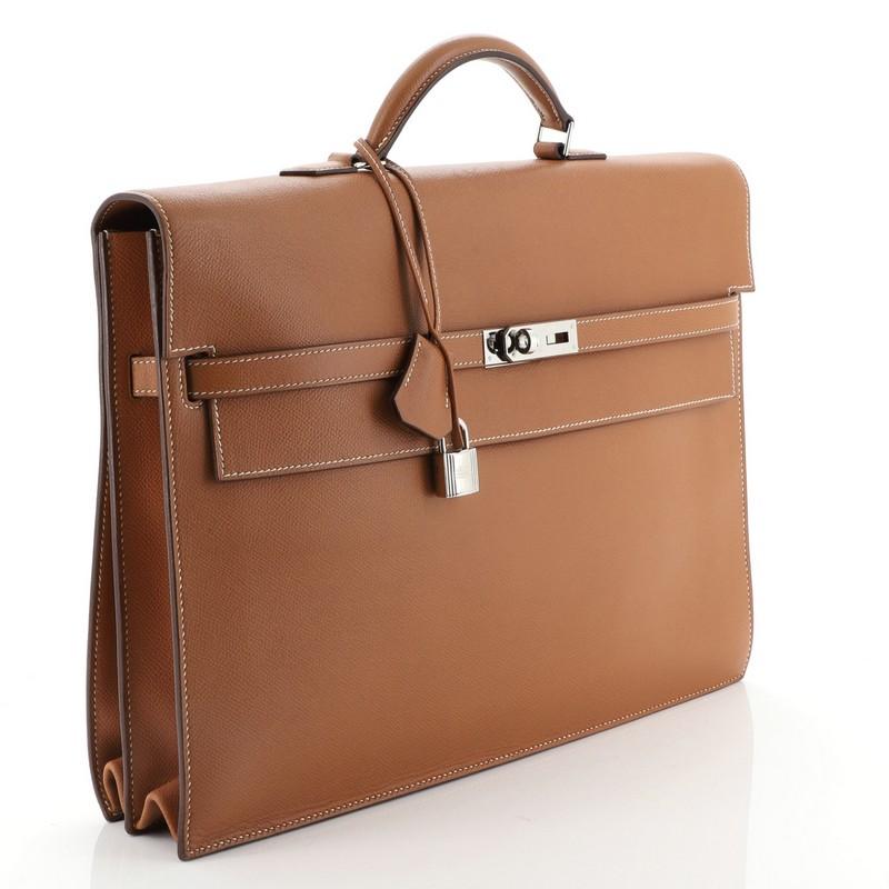Condition: Damaged. Wear on base corners and handle, moderate scuffs on exterior, cracking on flap wax edges. Bubbling, creasing and pen mark underneath flap, darkening and wear in interior, scratches on hardware. 
Accessories: Keys, Lock, Clochette