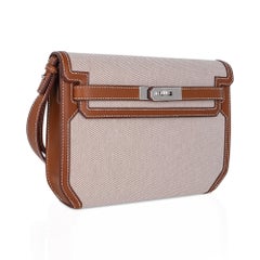 Hermes Kelly Depeches 25 Pouch Toile / Fauve Barenia Trim Bag Palladium Hardware