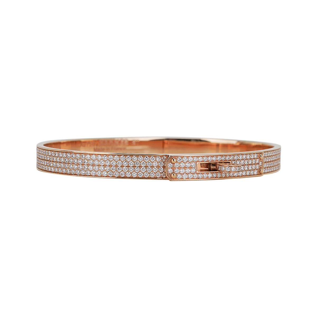 Mightychic offers an Hermes Kelly Bracelet Small Model set with 539 diamonds.
Chic and instantly recognizable this 18k Yellow Gold full set diamond bangle bracelet
is very difficult to procure. 
Total carat weight of the diamonds is 3.25 ct.