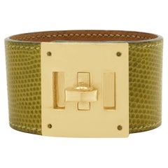 Bracelet Hermes Kelly en cuir jaune avec boucle en plaqué or