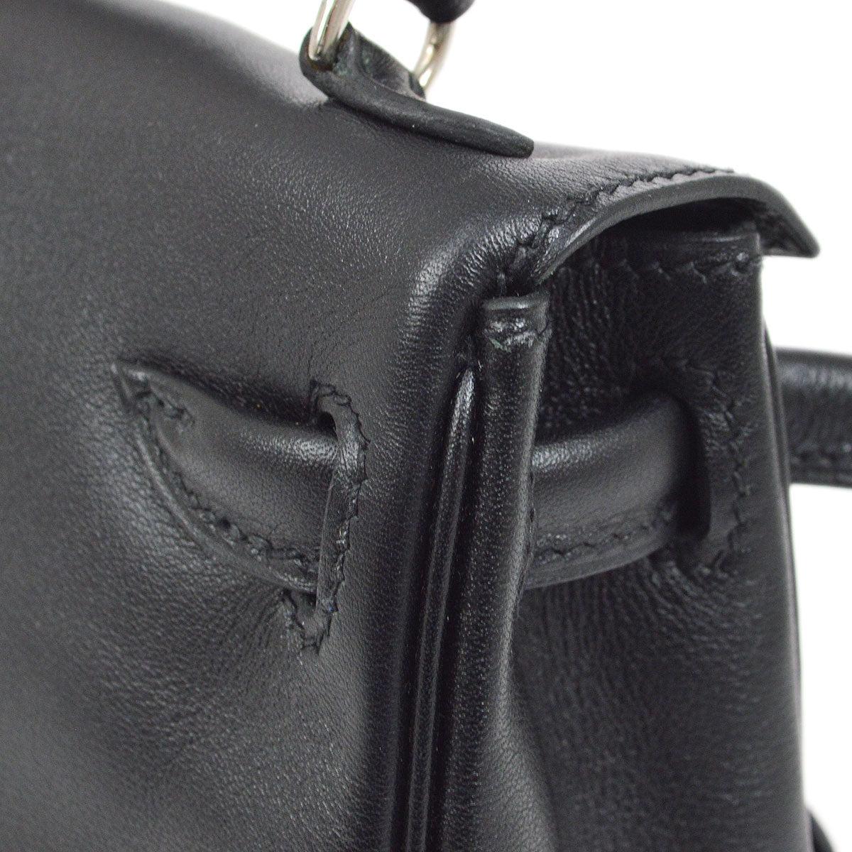 Petit sac mini Kelly Doll Hermès en cuir veau Gulliver noir avec accessoires en palladium en vente 1