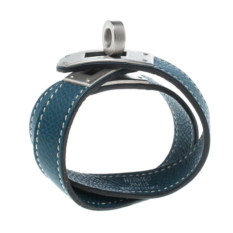 This Double Tour bracelet has blue leather straps to wrap around your wrist twice and a signature Kelly lock in palladium plating is provided to help fasten this wonder. There is no reason why you should not own this beauty from Hermes.

Includes: