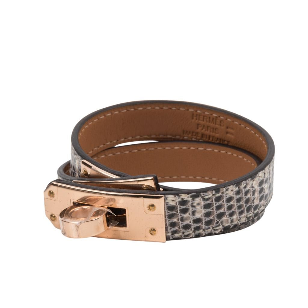 Mightychic offers an Hermes Kelly Double Tour Ombre Lizard bracelet featured with Rose Gold hardware.
This divine piece is sure to become a favorite!
NEW or NEVER WORN
Comes with brown pouch signature Hermes box and ribbon. 
final sale

SIZE 