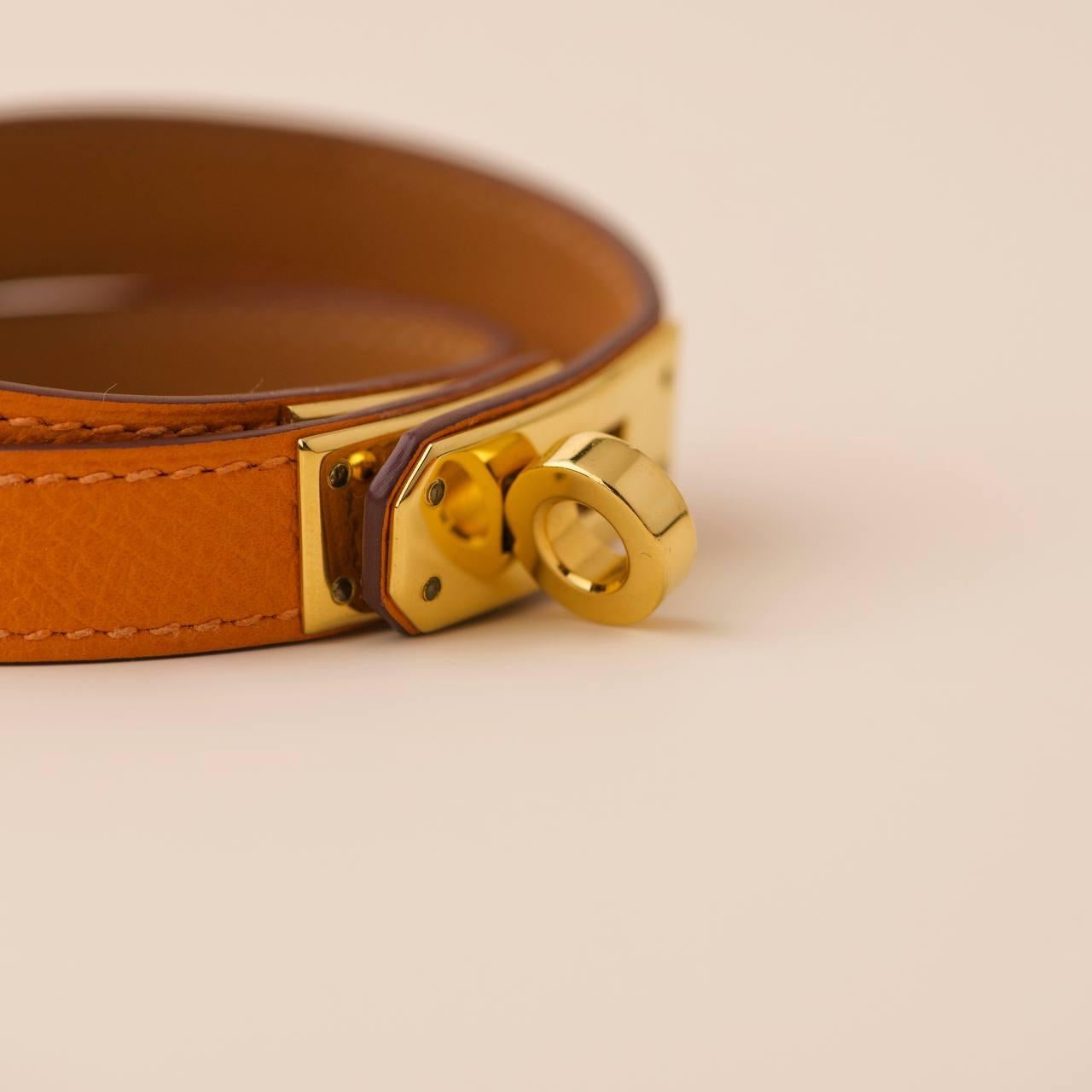  Hermès Kelly Double Tour Bracelet en cuir orange et or T1 Unisexe 