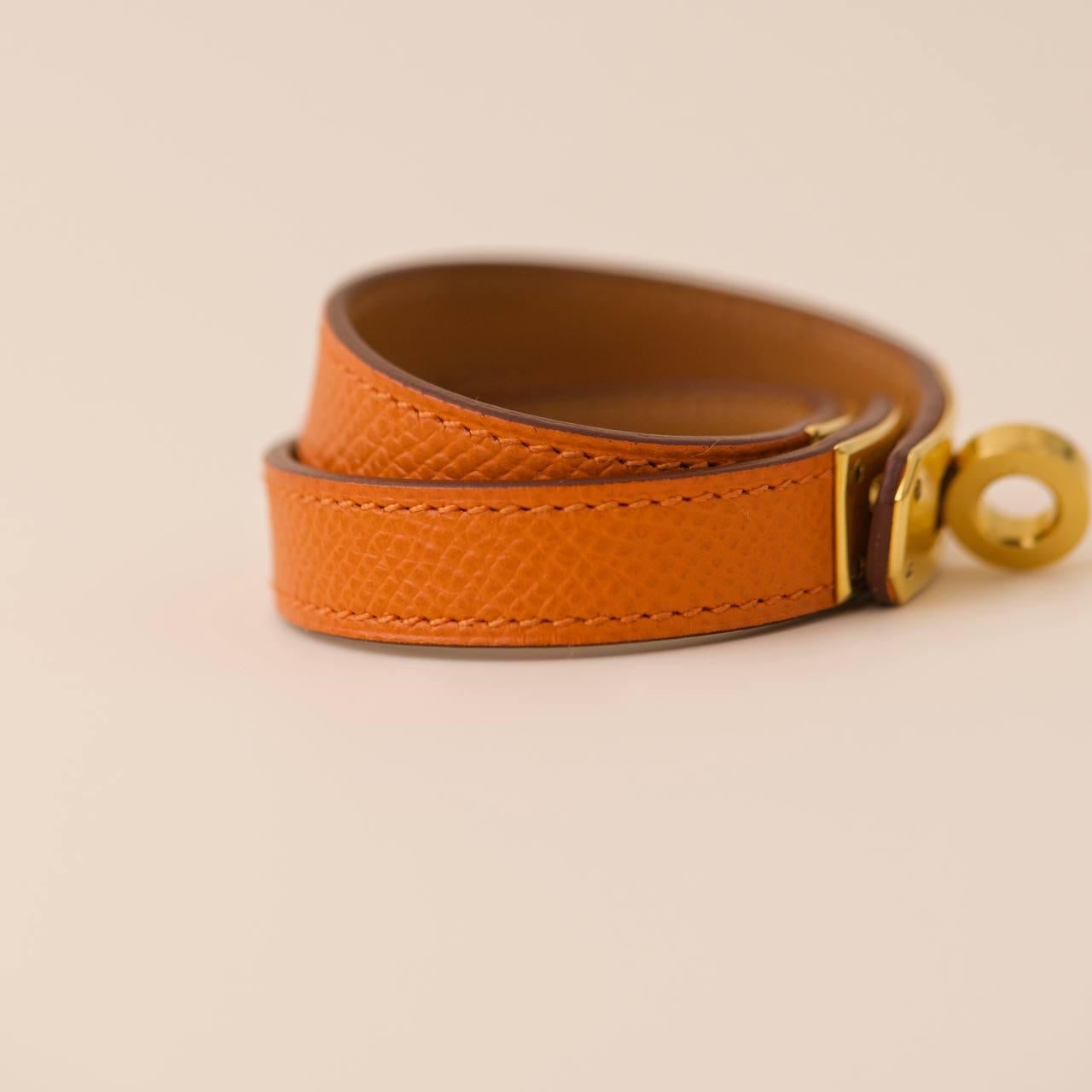 Hermès Kelly Double Tour Bracelet en cuir orange et or T1 2