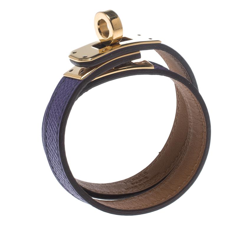 This Hermes Double Tour wrap bracelet is a chic accessory that can be paired with everything, from causals to evening outfits. Made from leather in a pretty purple shade, it is beautified with a Kelly twist closure in gold-plated metal. The bracelet