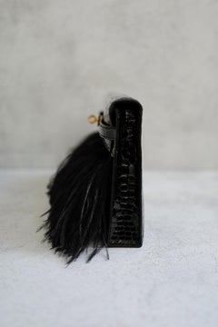 Hermès Kelly Elan Folie Clutch Black Porosus Crocodile & Feather Noir with Gold