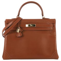 Hermes Kelly Ghillies sac à main Fauve Tadelakt avec matériel d'or 35