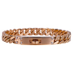 Hermès Kelly Gourmette Bracelet modèle très petit en or rose 18 carats avec quatre diamants